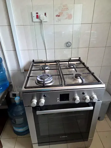 Bosch Stainless Steel Gas Cooker with Oven - 4 Burners, Good Working Condition