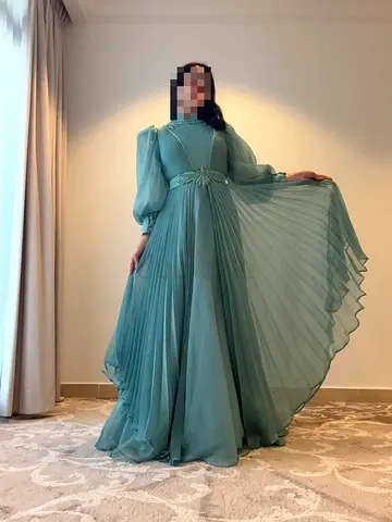 Elegant Sage Green Pleated Formal Gown with Sheer Puff Sleeves