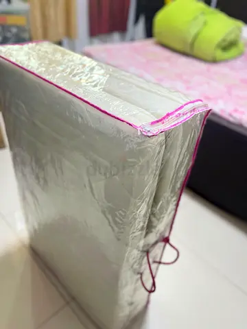 Folding foam mattress –  never used. Still in original packaging. Easy to store and carry.