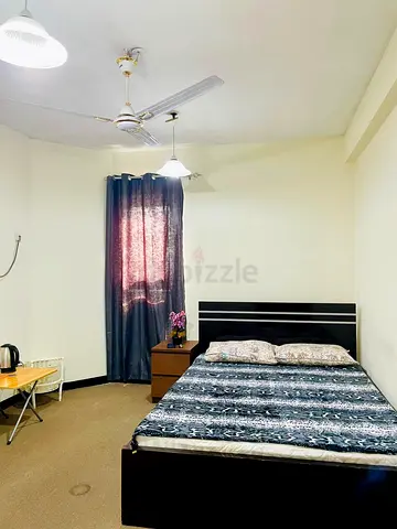 Spacious Furnished Family Room with Balcony | Near Karama