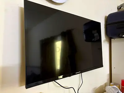 32-inch smart TV in brand new condition only 4 days old along with dish TV with 1 year subscription