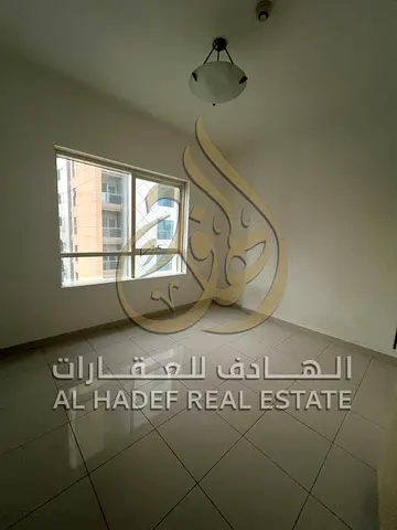 Three-bedroom apartment for rent in Al Khan area, prime location close to the sea and amenities. Features: Spacious three bedrooms and a living room