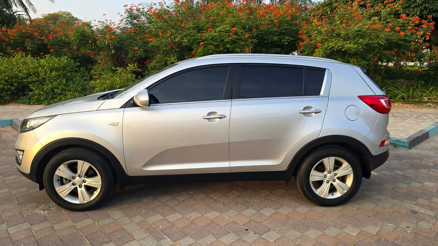 Kia Sportage 2014 — photo 1 of 15
