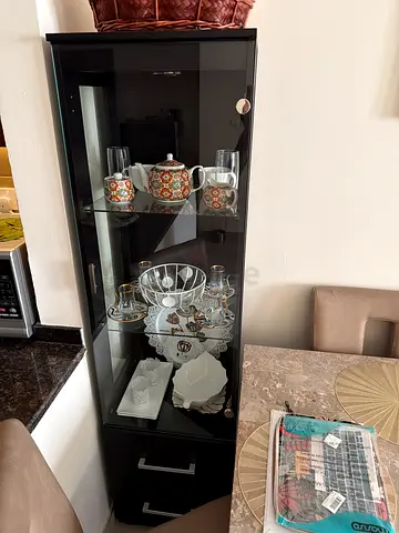 Black glass display cabinet with drawers - good condition