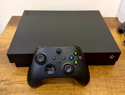 Xbox one X with Series X wireless controller