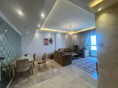 Beautiful two-bedroom apartment with a living room, furnished, with parking and hotel-style furnishi