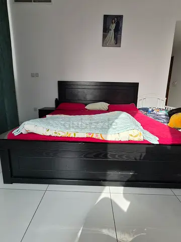 Solid Dark Wood Double king size Bed Frame with Headboard - Good Condition and with storage and wit