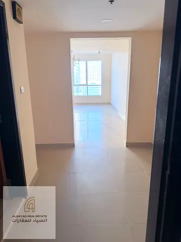 For sale: Two-bedroom apartment with a living room in Al Khan, near Al Qasba. Clean building with all amenities including gym, swimming pool, 24/7 sec