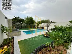 Villa for sale in the heart of Al Zorah, 4 bedrooms, 3950 sq ft, garden and swimming pool, competiti