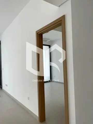 1BR Apartment with Sea & Pool View | Prime Location | Rented Unit | Strong Investment