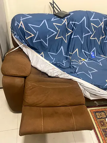 Brown reclining sofa with footrest - used, good condition