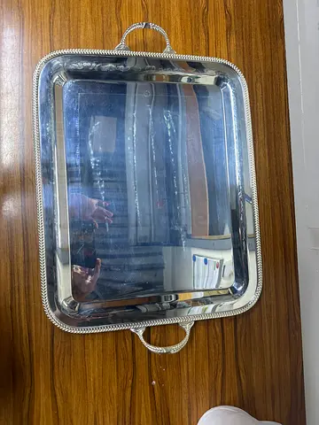 silver colored service tray