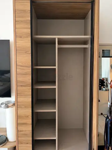 Wood wardrobe Spacious modern wardrobe in excellent condition.
