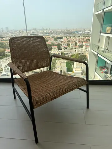 Woven Rattan Accent Chair with Black Metal Frame