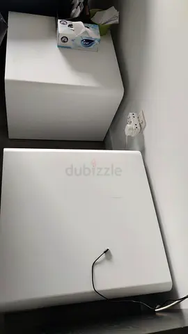 Two small white coffee tables - good condition