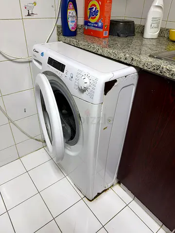 Used Front-Load Washing Machine - Functional, Some Cosmetic Damage