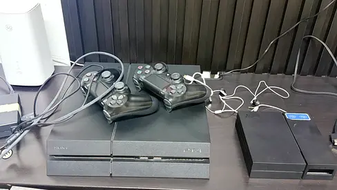 Sony PlayStation 4 (Original) with 2 Controllers