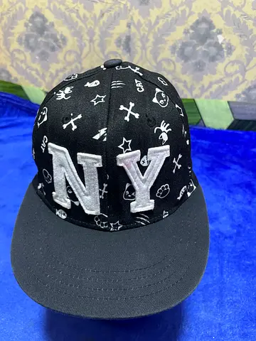 Black patterned baseball cap with embroidered AN logo - good condition