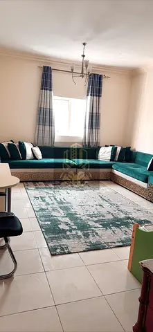 For rent at an attractive price: one bedroom and living room on Khalifa Street, near Gulf Bridge, including parking.