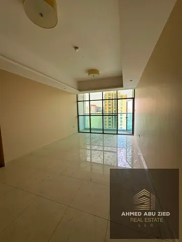 Two bedrooms and a living room in Gulf Tower with a swimming pool, gym and two free parking spaces