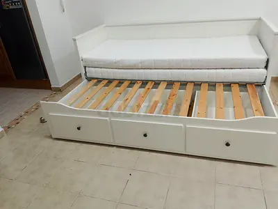 IKEA Hamnes day bed with 3 big storage drawers underneath and with 2 IKEA mattresses