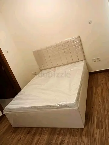 Family frame with mattress and upholstered headboard - like new