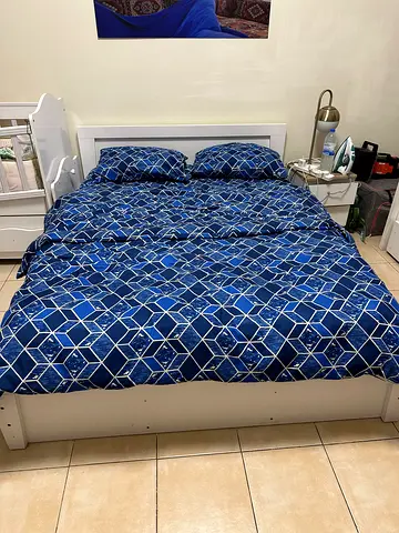 White wooden single bed frame with mattress (no beddings and pillows) total price aed 1,700