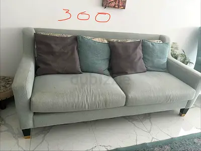 turquoise color couch x2. beautiful and comfortable .
