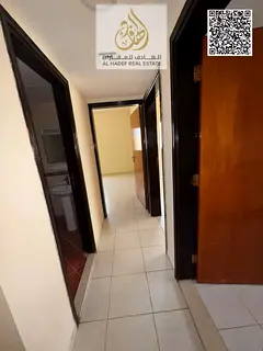 Two-bedroom apartment with a separate living room – balcony with an open view – Al Naeemia, near