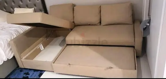 Ikea L shape sofa store cum bed and you can fix the storage lift or right