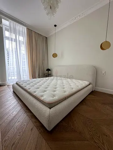 Minimalist upholstered double bed  - light cream