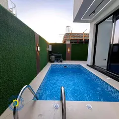 Prime location in Al Zahia, luxury villa with 5 bedrooms, roof terrace, and swimming pool, registrat