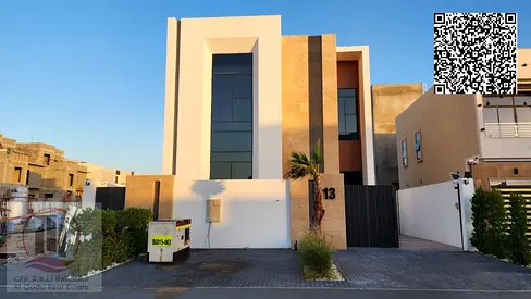 Luxury villa with 5 bedrooms and a rooftop for sale at a special price, including registration fees, in Al Zahia.