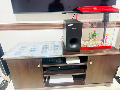 wooden TV cabinet with storage shelves