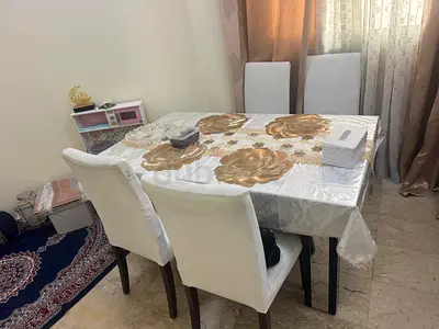 Dining table with 4 upholstered chairs - good condition