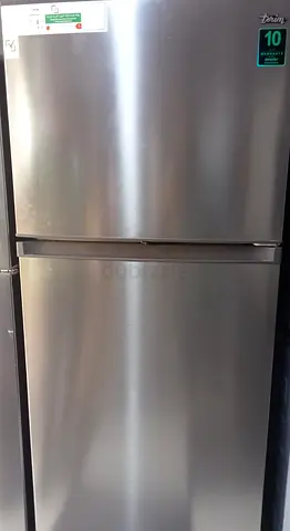 Silver double-door refrigerator (top freezer) - good condition