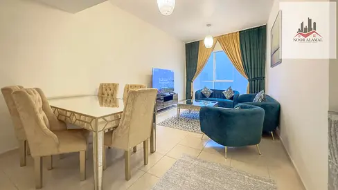 Deluxe three -bedroom apartment with a spacious living room, fully equipped kitchen, and three bathrooms.