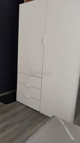 White multi-drawer wardrobe/cabinet — good condition