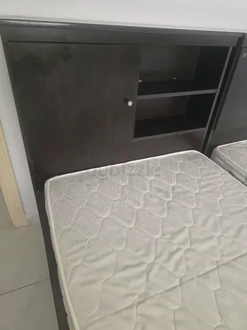 Double bed frame with built-in headboard storage and mattress (used)