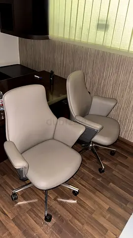 Pair of ergonomic swivel office chairs in light grey (used)