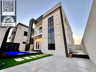 🏡 فيلا فاخرة للبيع في منطقة الحليو – عجمان ✨  فرصتك لامتلاك فيلا راقية بتصميم عصري وموقع مميز:  🔹 المواصفات: شامله رسوم التسجيل 4  غرف نوم ماستر واس