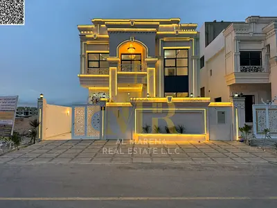 Luxury villa for sale in Al Helio 1 – Prime location opposite Al Safir Hypermarket | 6 master bedrooms | Two floors + roof | Two living rooms + majlis