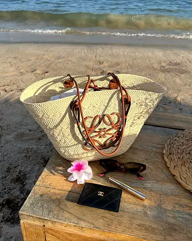 Straw beach tote bag with leather handles — perfect for beach days