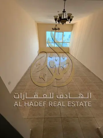 للإيجار في التعاون – شقة غرفتين وصالة مع جيم ومسبح وتكييف مجاني – دفعات مرنة! فرصة رائعة للسكن في منطقة التعاون الحيوية في الشارقة