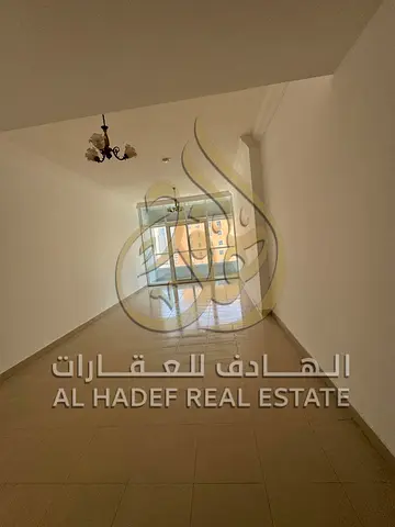 للإيجار – شقة غرفتين وصالة في التعاون | جيم + مسبح + صيانة مجانية  فرصة رائعة للسكن في واحدة من أفضل مناطق الشارقة – التعاون