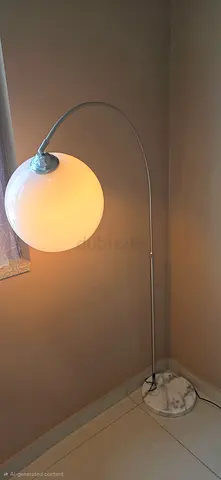 Arc floor lamp with marble base and globe shade