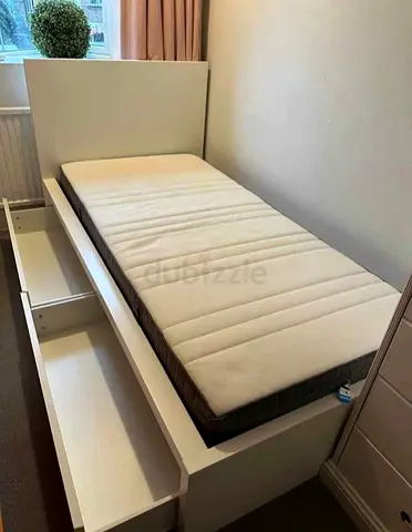 Malam single  bed 90/200cm bed and Ikea mattress is available in excellent condition,