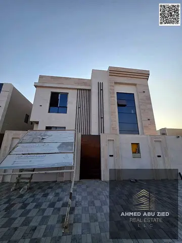 For sale: luxury 7BR villa w/ hall & roof in Al Zahia. Master rooms, 2 halls, majlis, internal parking.