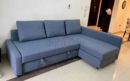Ikea L shape sofa store cum bed and you can fix the storage lift or right anyside you
