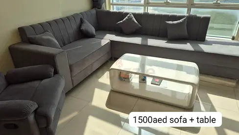 Light Grey L-Shaped Corner Sofa with Coffee Table - Good Condition